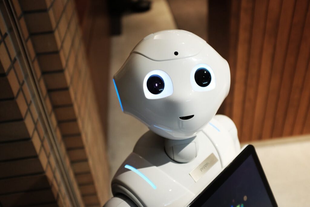 pexels-photo-2599244 A futuristic humanoid robot in an indoor Tokyo setting, showcasing modern technology.
